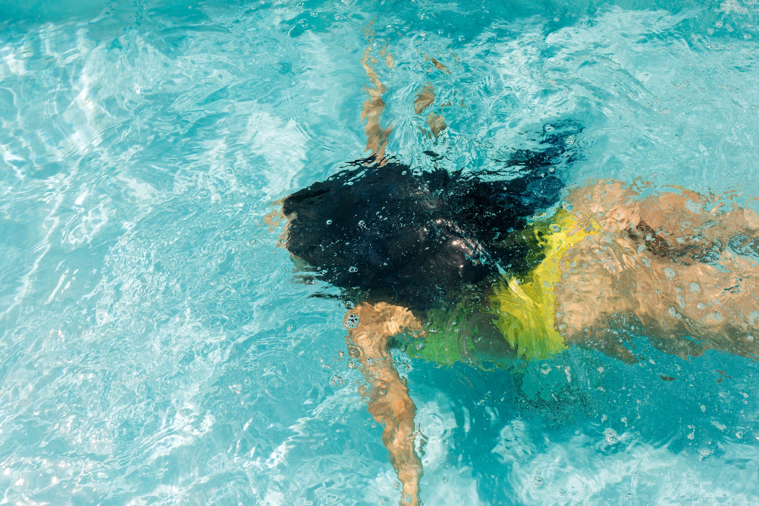 swimming at the rooftop pool at the source hotel