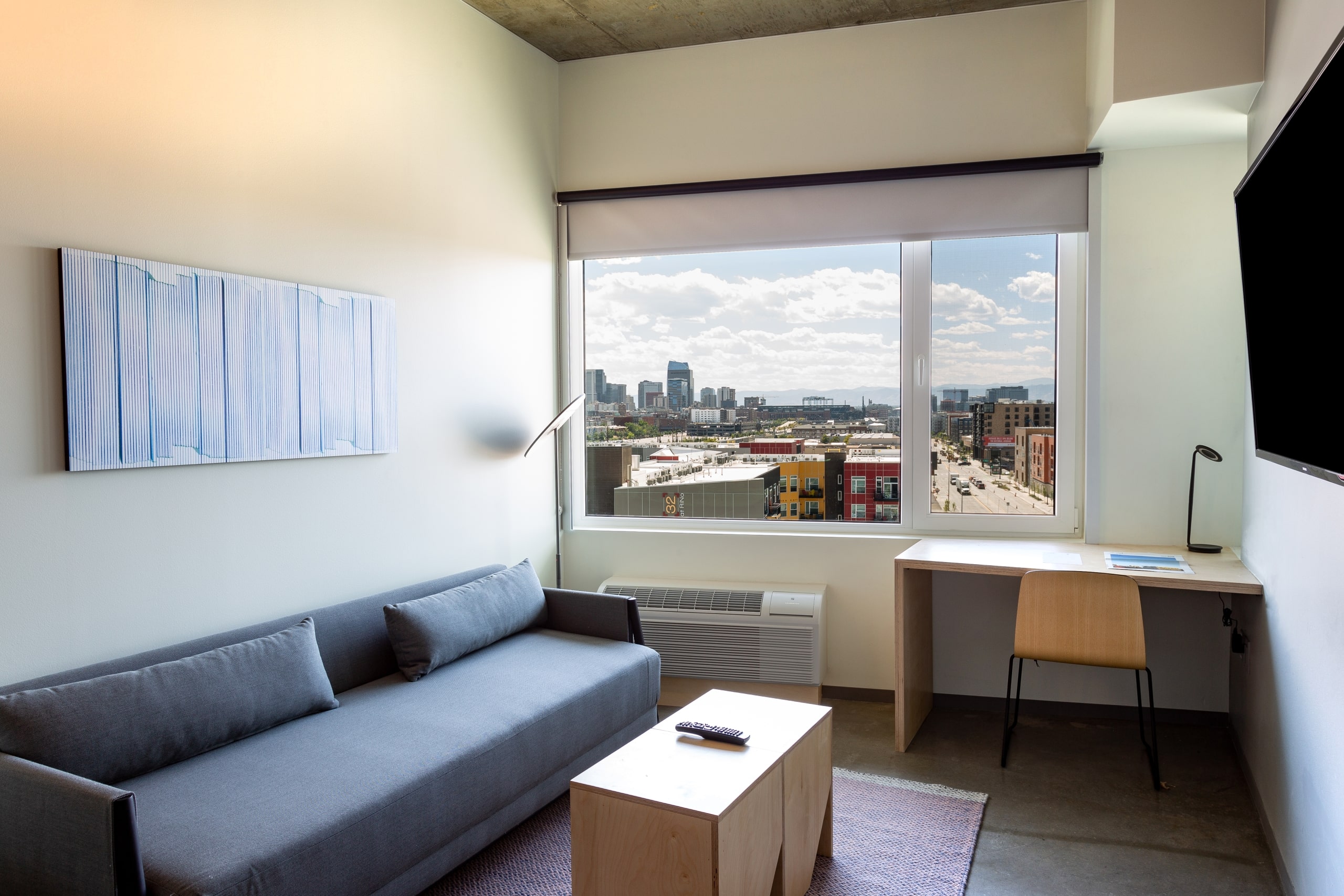 TheSourceHotel_Accommodations_SuiteSkyline_LivingRoom