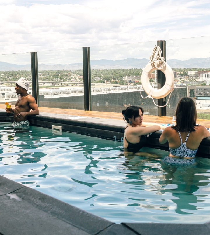 guests in the pool at the source hotel