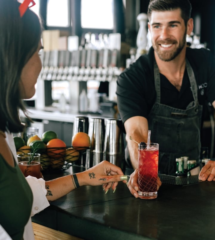bartender serving cocktail