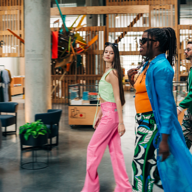 2 women walking with shopping bags