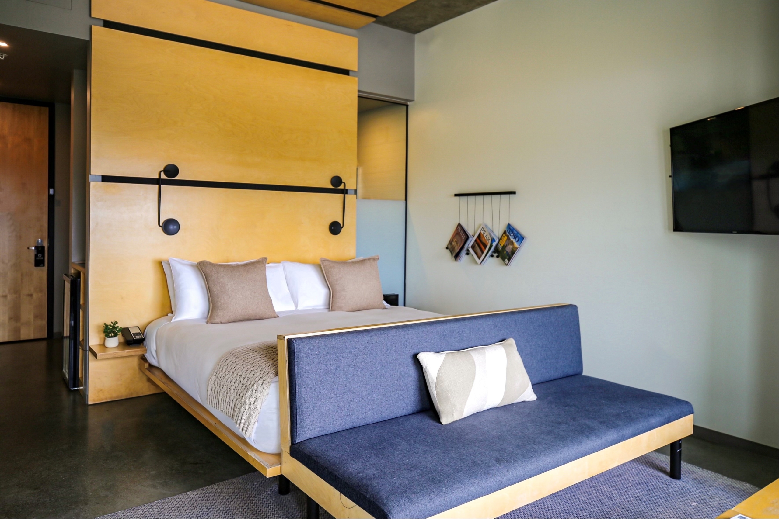 guestroom bedroom at source hotel in denver colorado