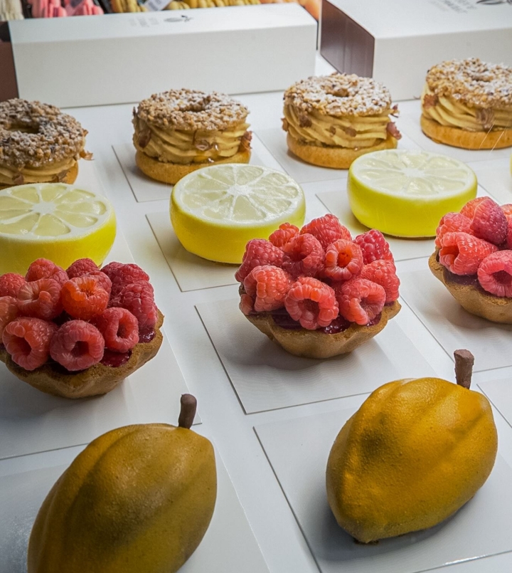 pastries in a case from chocolate company at source market in denver
